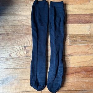 Lululemon black high socks. One size